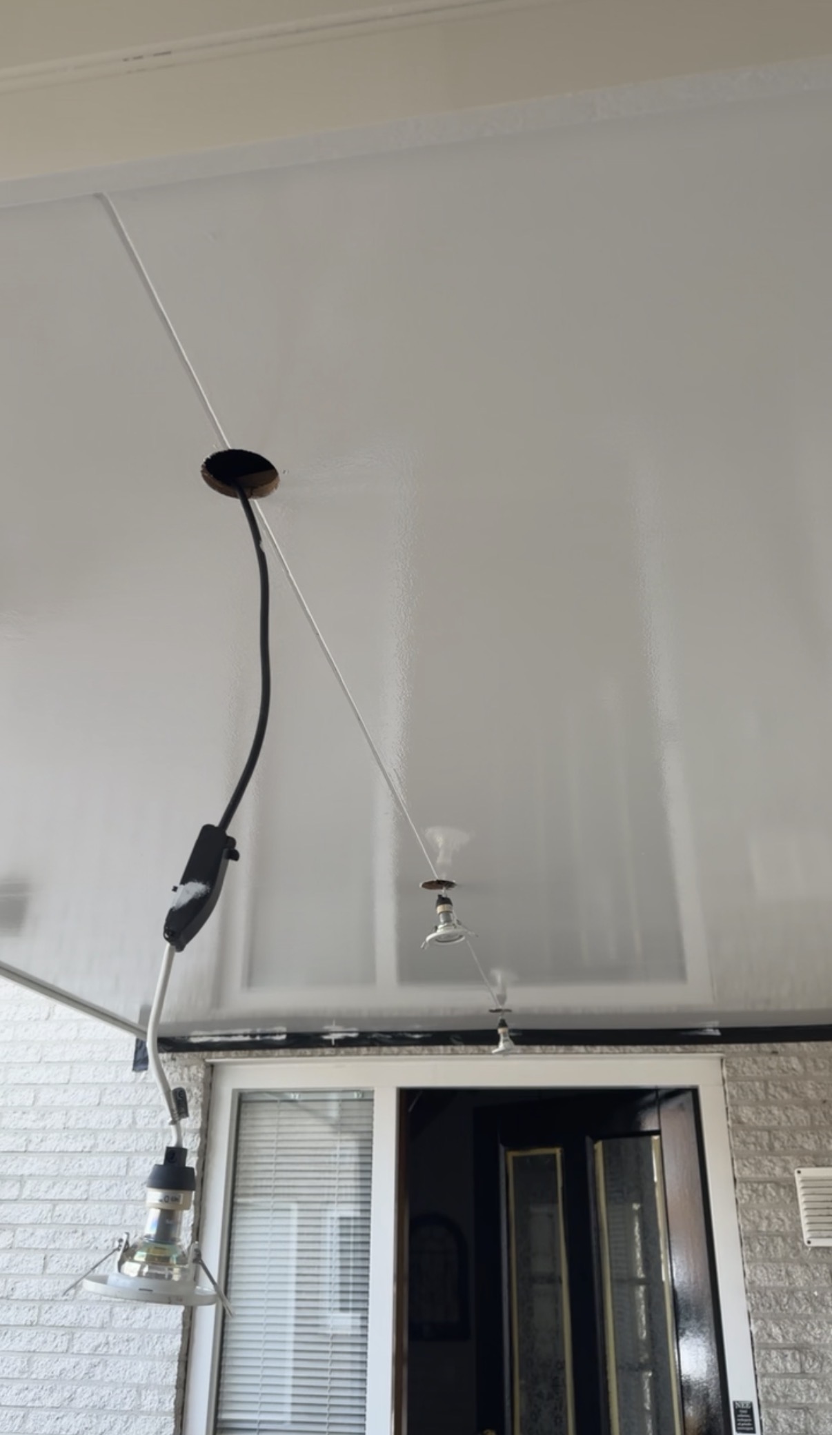Fris geschilderde overkapping en plafond